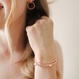 Model Wearing Heart Beaded Triple Layered Bracelet in Rose Gold