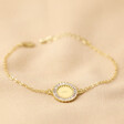 Personalised Initials Crystal Edge Disc Bracelet in Gold on Neutral Fabric