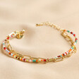 Rainbow Glass Bead and Chain Bracelet in Gold on Cream Fabric