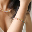 Model Showing Rainbow Glass Bead and Chain Bracelet in Gold