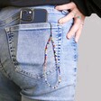 Colourful Millefiori Bead Phone Strap Hanging from Phone in Jeans Pocket
