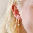 Close Up of Model Wearing Amazonite Stone Hoop Earrings in Gold