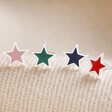 Mismatched Pack of 4 Enamel Star Stud Earrings in Silver on Neutral Background