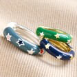 Starry Green Enamel Hoop Earrings Next to Other Available Colours in Navy and Blue