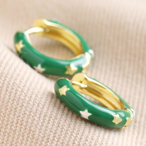 Starry Green Enamel Hoop Earrings on Natural Coloured Fabric