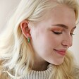 Starry Green Enamel Hoop Earrings on Model from Further Away