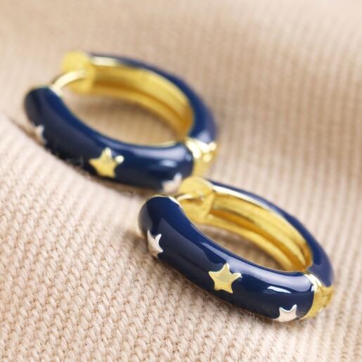 Starry Navy Enamel Hoop Earrings on Cream Coloured Fabric