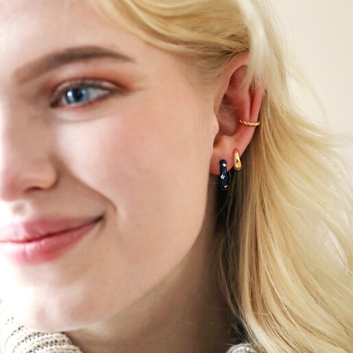 Starry Navy Enamel Hoop Earrings on Model with Neutral Background