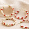 Red, White and Pink Twisted Enamel Hoop Earrings in Gold next to Red and White Version