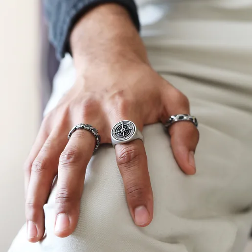 Model Wearing Men's Feather Arrow Stainless Steel Ring With Other Styles