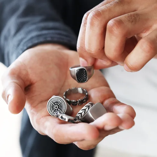 Model Holding All Stainless Steel Rings Available in Palm