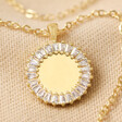Close Up of Crystal Edge Disc Pendant Necklace in Gold