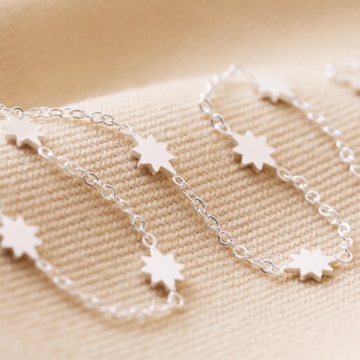 Close Up of Long Starry Necklace in Silver