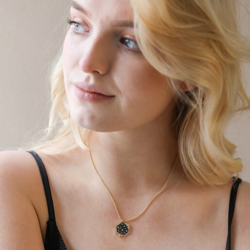 Blonde Model Wearing Navy Enamel Celestial Bee Pendant Necklace in Gold with Black Top