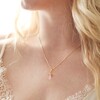 Rose Quartz Crystal Point Pendant Necklace in Gold on Model
