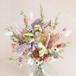 Close Up of Pastel Dried Flower Bouquet Arranged in Vase
