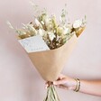 Model Holding Sympathy Dried Flower Bouquet