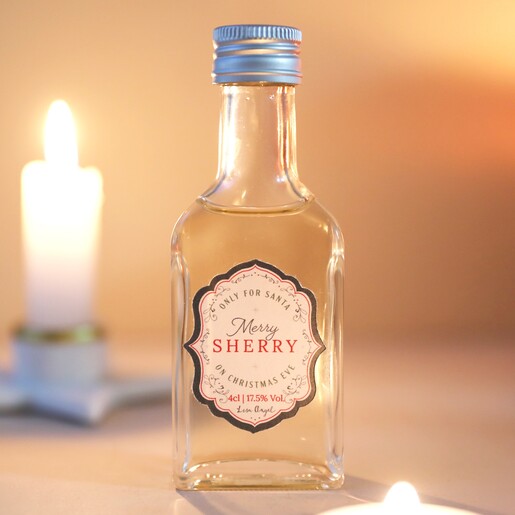 4cl Bottle of Merry Sherry for Santa Among Festive Lighting