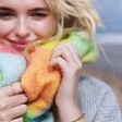 Close Up of Blonde Model Wearing Neon Brights Check Winter Scarf