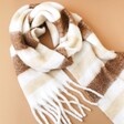 Neutral Striped Winter Scarf Looped on Terracotta Background