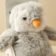 Close Up of Penguin Plush on Neutral Background