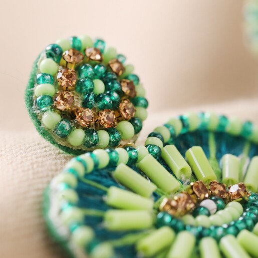 Close Up of Crystal Detailing on My Doris Eye Love You Teal Beaded Heart Drop Earrings