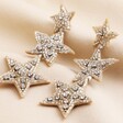 My Doris Silver Star Beaded Drop Earrings on Beige Coloured Fabric