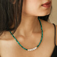 Model Wearing Teal Beaded Party Necklace in Gold with No Other Jewellery
