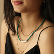 Teal Beaded Party Necklace in Gold on Model with Other Necklaces