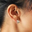 Brushed Wide Huggie Hoop Earrings in Silver Close Up on Model