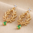 Green Stone and Crystal Fern Drop Earrings in Gold on Beige Coloured Fabric