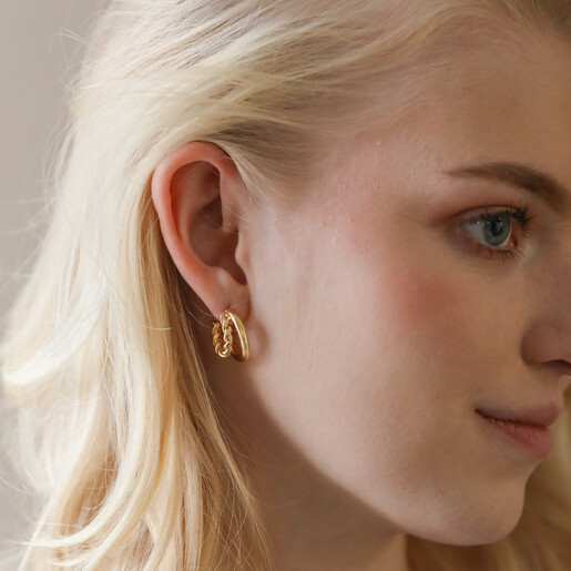 Model Wearing Illusion Rope and Polished Hoop Earrings in Gold