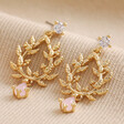 Pink Stone and Crystal Fern Drop Earrings in Gold on Beige Coloured Fabric