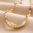Close Up of Pendant on Rainbow Beaded Feather Charm Necklace in Gold
