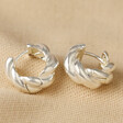 Rope Huggie Hoop Earrings in Silver on Beige Fabric