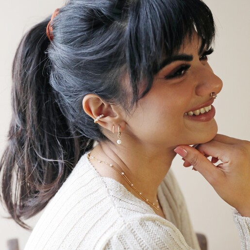 Rope and Pearl Ear Cuff in Gold on Model Worn With Other Gold Jewellery