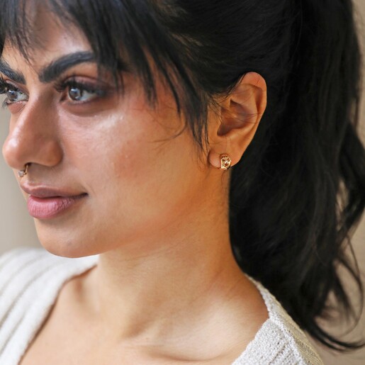 Model Wearing Tiny Star Cut-Out Huggie Hoop Earrings