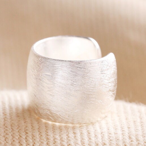 Wide Brushed Ear Cuff in Silver on Beige Coloured Fabric