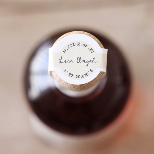 Top of Personalised 100ml Merry Christmas Port bottle against wooden backdrop