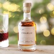 Personalised 100ml Merry Christmas Port with white port inside and Charlie personalisation