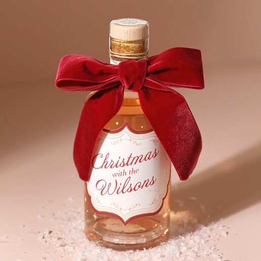 Personalised 500ml Family Christmas Spiced Gin on pink board
