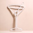 Cocktail Glass Neon LED Wall Light in Pink unlit against beige background