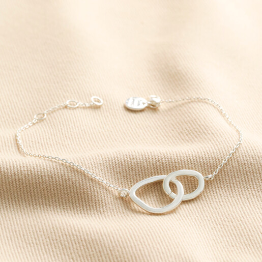 Organic Interlocking Hoops Bracelet in Silver on Beige Fabric