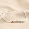 Rainbow Baguette Crystal Bar Bracelet in Silver on Beige Fabric