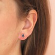 Blue Crystal Stud Earrings in Gold Close Up On Model