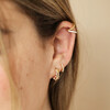 Curated look of Irregular Crystal and Pearl Huggie Hoop Earrings in Gold on model