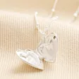 Open Heart Locket Necklace in Silver on Beige Fabric