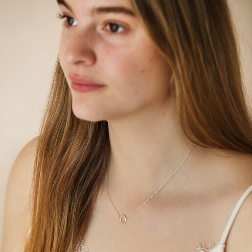 Model looking to side wearing Personalised Eternity Ring Pendant Necklace in silver