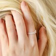 Adjustable Clear Baguette Crystal Band Ring in Silver on model with hand in hair