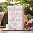 Personalised Fill Your Own Toy Shop Advent Calendar in lifestyle shot in front of christmas tree